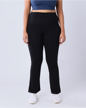 https://assets.ajio.com/medias/sys_master/root/20230624/QNML/649633ffa9b42d15c9d6344f/blissclub_bliss_black_women_tall_groove-in_cotton_flare_pants_with_4_pockets.jpg