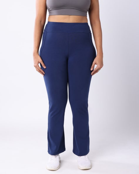 https://assets.ajio.com/medias/sys_master/root/20230624/RKj4/649656e0a9b42d15c9db09bd/blissclub-naina-navy-straight-women-tall-groove-in-cotton-flare-pants-with-4-pockets.jpg