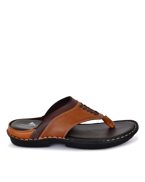 Tan flip flops discount with black straps