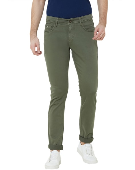 sunnex olive green slim mid rise slim fit jeans