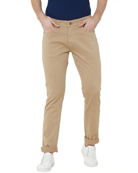 sunnex beige slim mid rise slim fit jeans