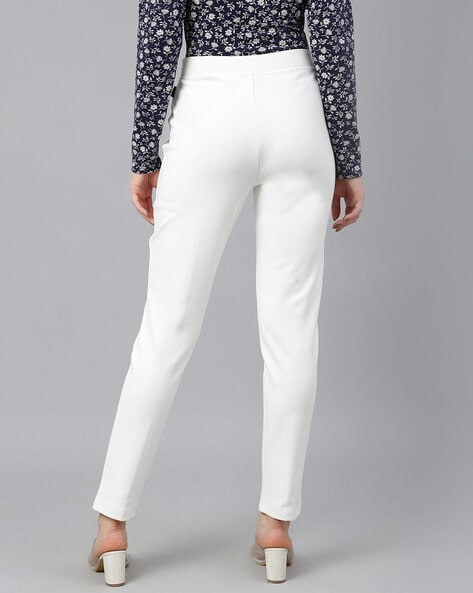 Buy MADAME White Skinny Fit Mid Rise Trousers for Women Online  Tata CLiQ