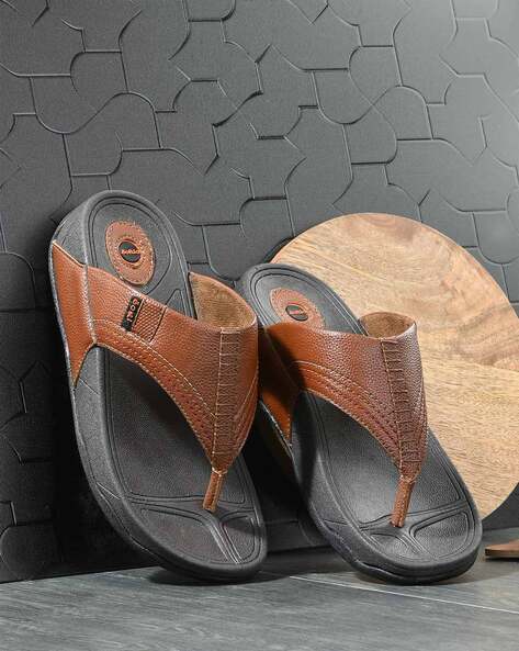 Buy Tan Flip Flop Slippers for Men by SOFTIO Online Ajio