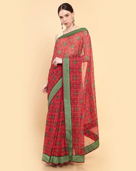 Maroon Georgette Saree With Ethnic Embroidery And Stones at Soch