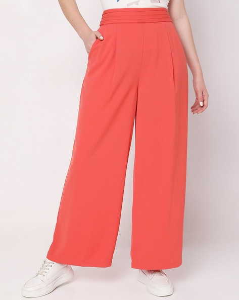 The latest collection of orange trousers & pants for women | FASHIOLA.in