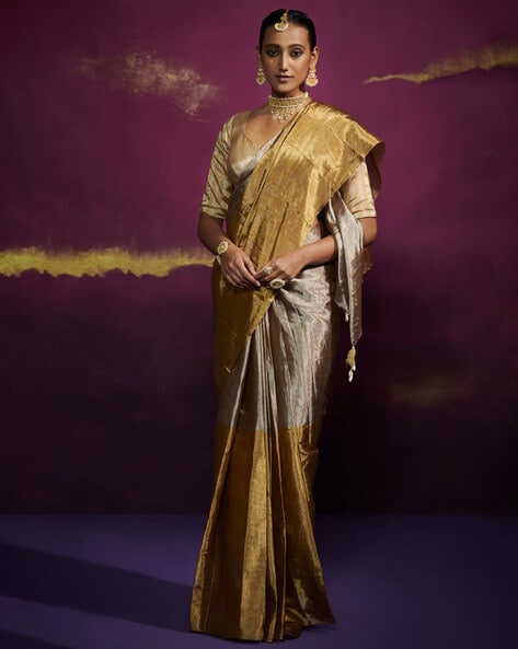 Tissue saree with silver zari stripes in all over the body – Priyal Bhardwaj