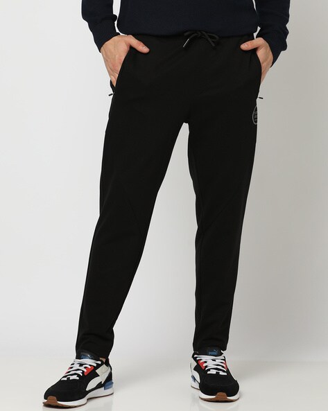 TEAMSPIRIT Solid Women Black Track Pants - Buy TEAMSPIRIT Solid