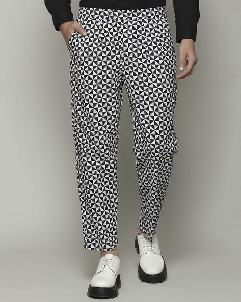 Patou | Iconic long trousers in organic cotton jacquard