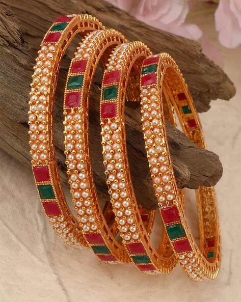 Gold bangles with stones on sale designs