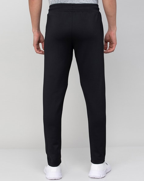 Buy Women Black Solid Slim Fit Track Pants online  Looksgudin