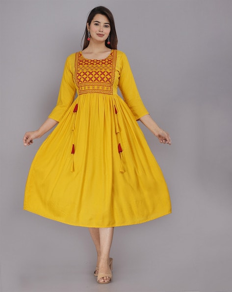 Buy Mustard Kurtas for Women by NISHABD Online