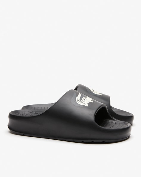 Lacoste black best sale flip flops