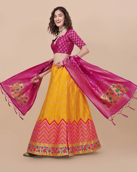 Yellow embroidered net semi stitched lehenga with dupatta - Melluha Fashion  - 2301806