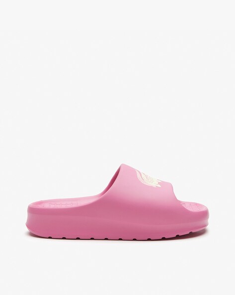 Pink and discount white lacoste sliders