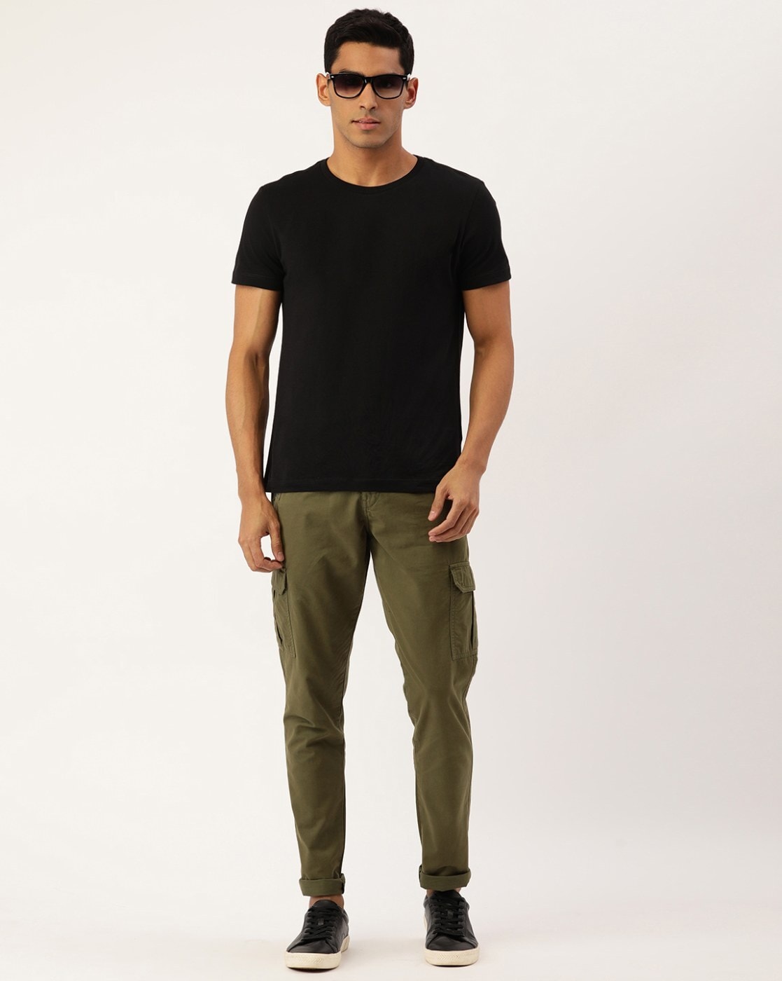 Black top olive green pants outfit  Green pants outfit Olive green pants  outfit Olive green pants