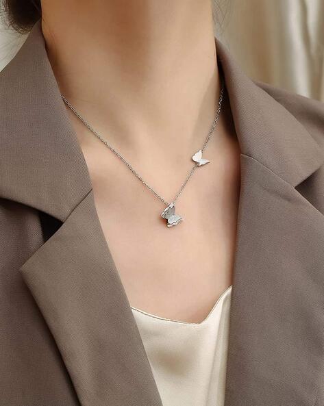Amazon.com: Amazon Essentials women Sterling Silver Genuine Sky Blue Topaz Butterfly  Pendant Necklace, 18
