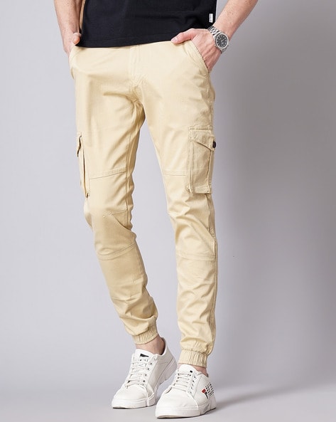 Buy Raa Jeans Men CreamColoured Slim Fit Solid Regular Trousers online   Looksgudin