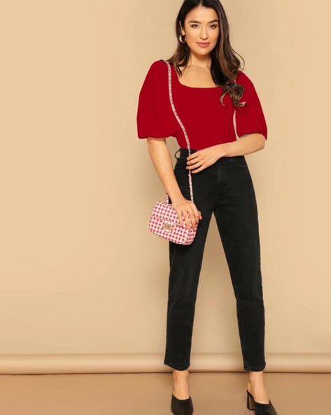 Woman in Black Long Sleeve Shirt and Red Pants · Free Stock Photo