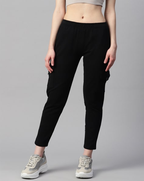 https://assets.ajio.com/medias/sys_master/root/20230629/79s4/649cb431a9b42d15c9177537/laabha-black-fitted-women-fitted-track-pants-with-flap-pockets.jpg