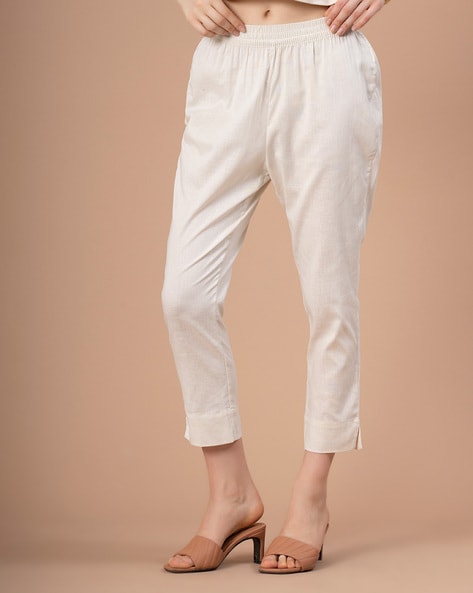Offwhite cotton straight pants with dori embroidery at hem  Kora India