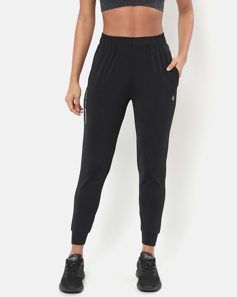 UNDER ARMOUR Solid Women Black Track Pants - Buy UNDER ARMOUR Solid Women  Black Track Pants Online at Best Prices in India