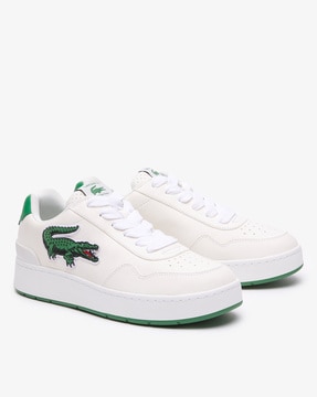 All white lacoste shoes best sale