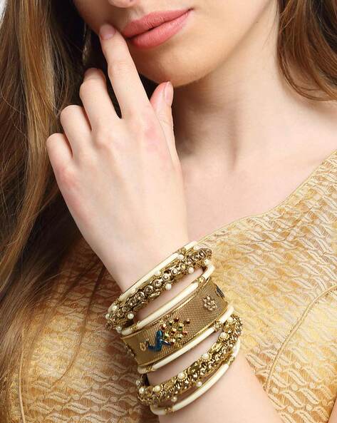 Layer them up: Gold Single Hammered Stacking Bangles