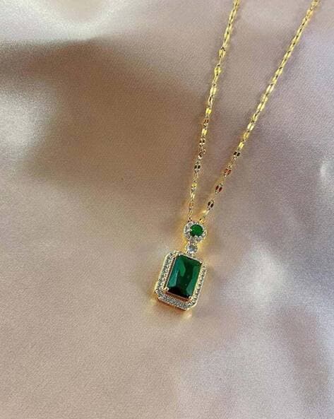 Sold at Auction: AN 18CT GOLD EMERALD PENDANT NECKLACE; featuring a fine square  emerald cut emerald of approx. 6.50ct (chipped culet and pavilion fac...