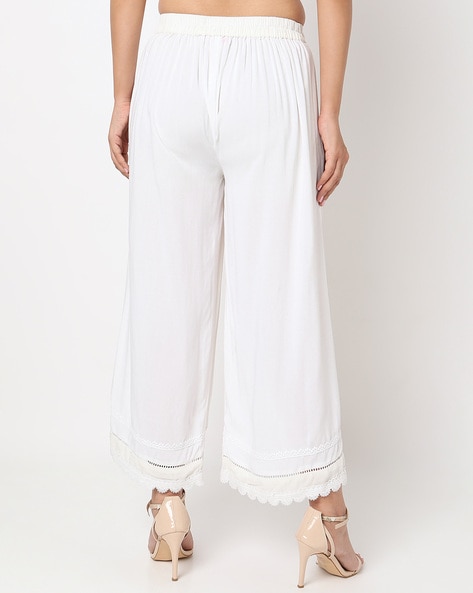 White double layered pants by Ikshita Choudhary | The Secret Label