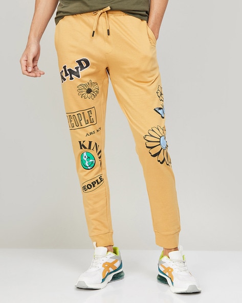 Buy Yellow Track Pants for Men by SmileyWorld Online Ajio