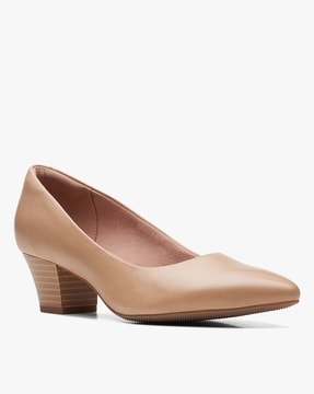 Clarks store pumps beige