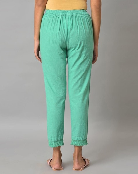Dolce & Gabbana Flared Lace Trousers, $688 | farfetch.com | Lookastic