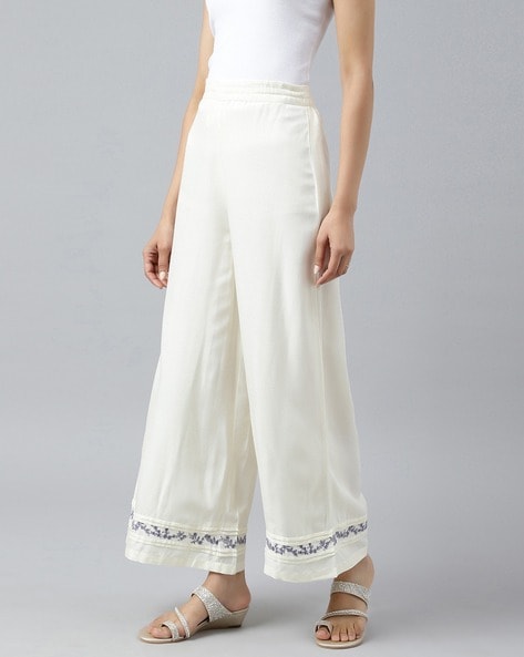 Buy White Polyester Solid Parallel Trousers online  Looksgudin