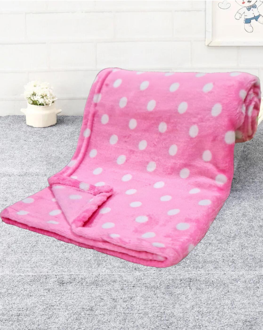 Pink polka dot store blanket