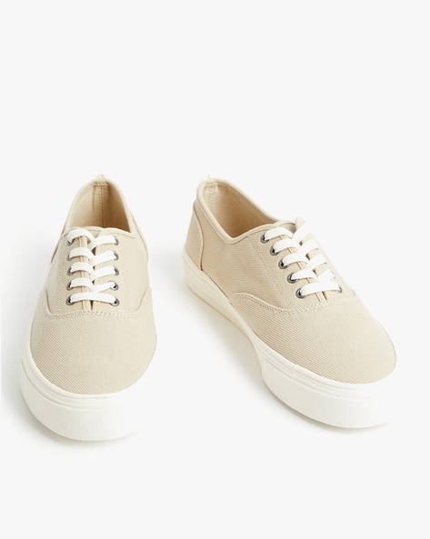 Canvas lace hot sale up trainers