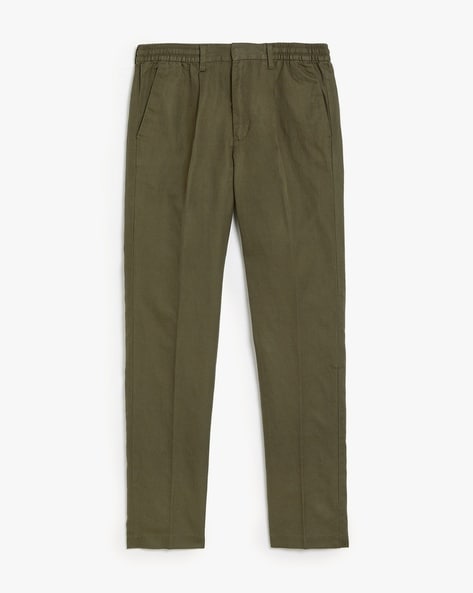 Buy Brown Relaxed Tapered Linen Blend Pleated Front Trousers from