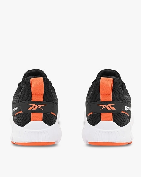 Reebok shoes sales black and orange