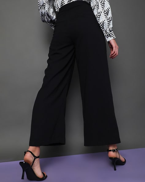 Buy MAGRE Women Black Loose Fit Solid Parallel Trousers - Trousers for  Women 8086083 | Myntra