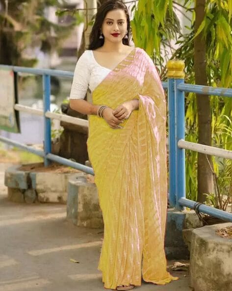 Yellow organza saree with cotton embroidery blouse – Threads