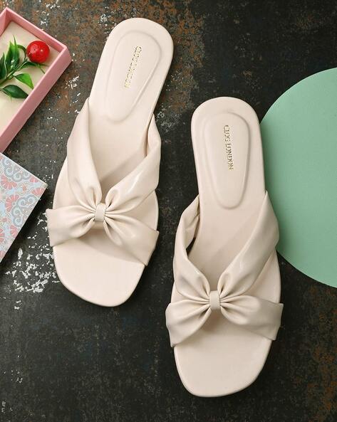 White bow best sale flip flops