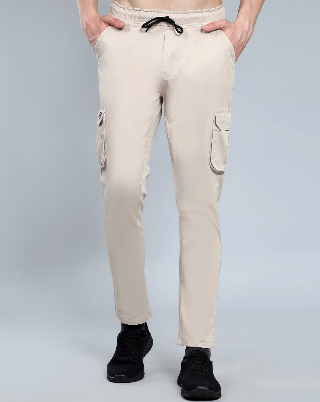Buy Highlander Beige Loose Fit Solid Cargo Trouser for Men Online at Rs.796  - Ketch