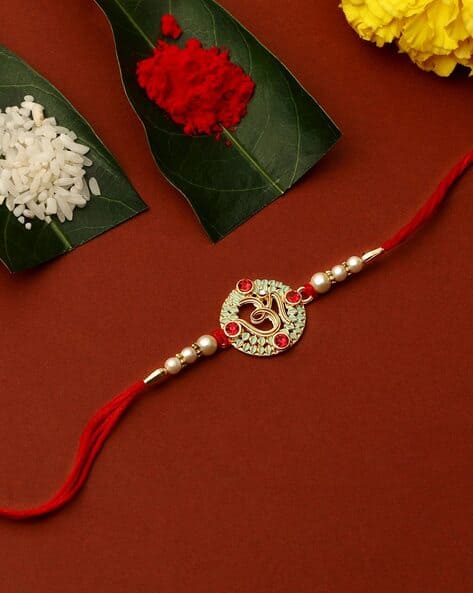 MATCHITT Om Design Ruby Stone-Studded Gold Finish Rakhi