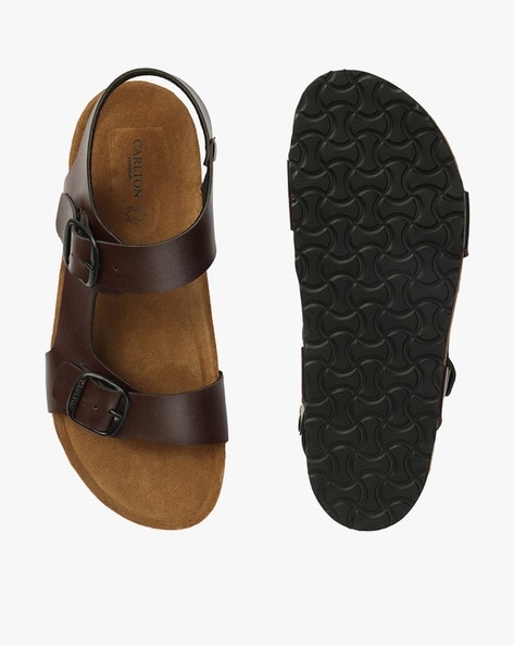 Brown slip store on sandals