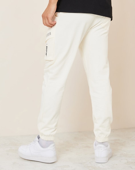 Buy Cream Track Pants for Men by Styli Online