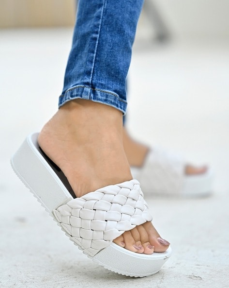 Buy White Textured T-strap Flat Sandals by Sole Fry Online at Aza Fashions.