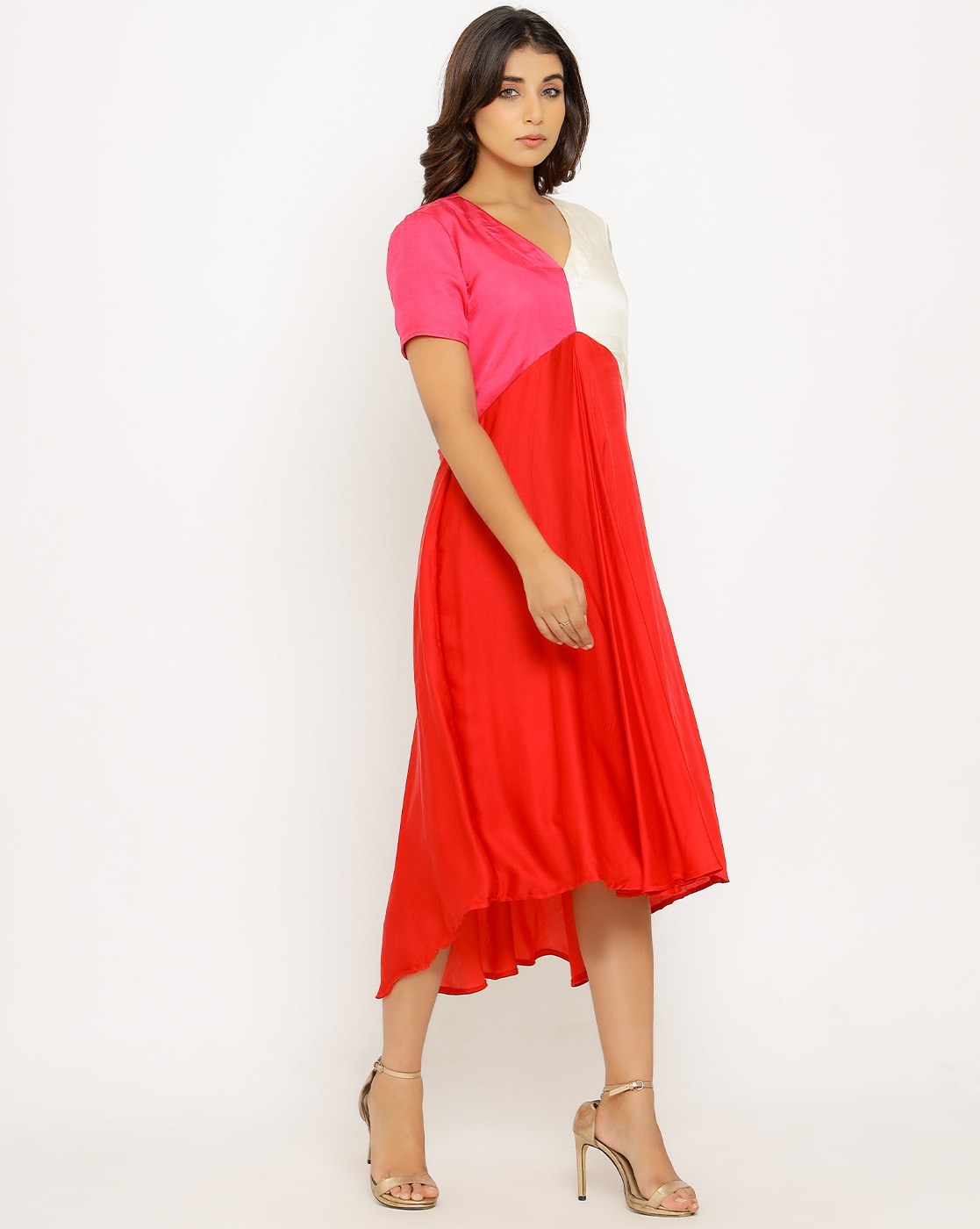 red midi dress worn with black turtleneck and accessories