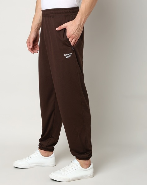 Reebok logo-patch tapered track trousers | Smart Closet