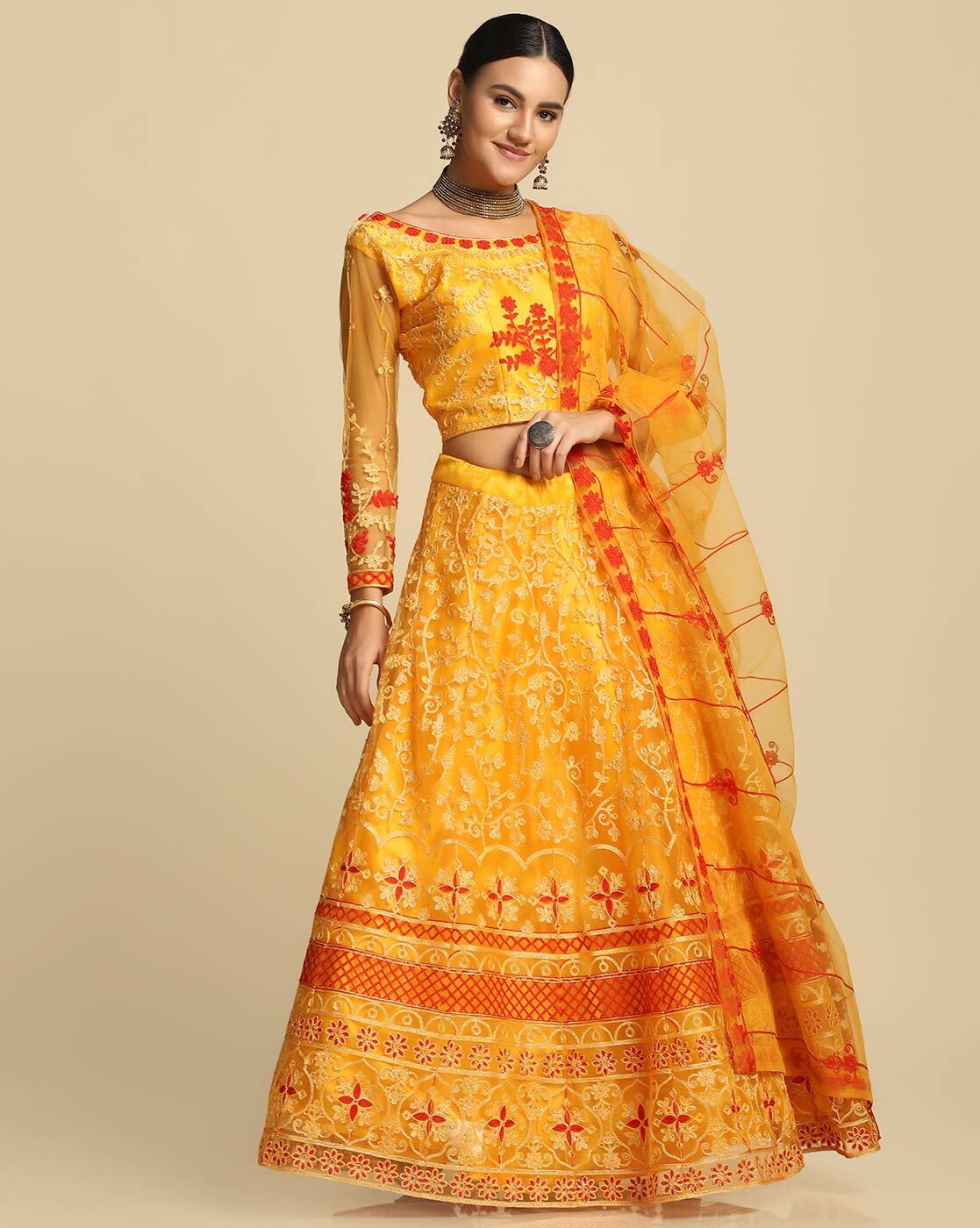 Latest Yellow Color Soft Net Mirror Work Flared Lehenga Choli With Matching  Dupatta