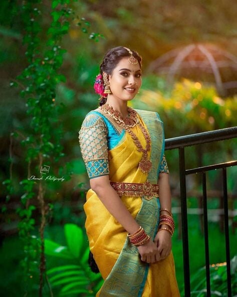 DD Neelakandan looking beautiful in a yellow silk saree! | Fashionworldhub