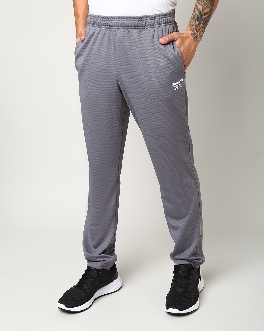 Buy Grey Trousers & Pants for Men Reebok Online | Ajio.com
